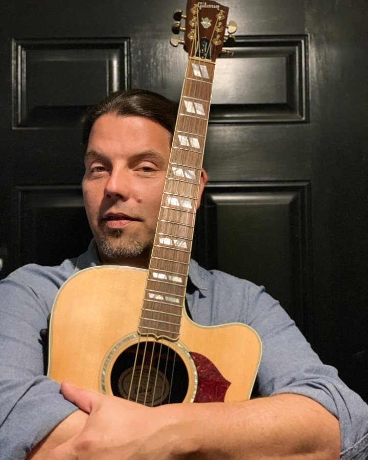 Bill West with guitar